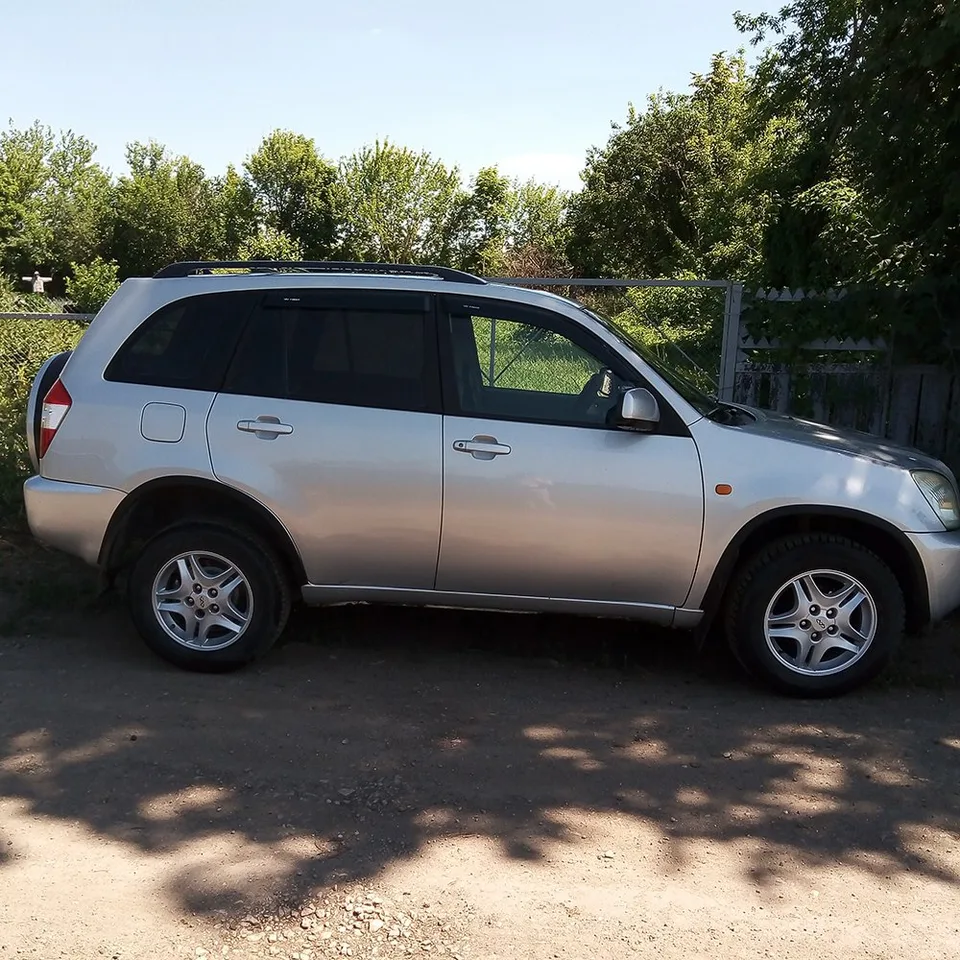 Chery Tiggo — Накладки на колёсные арки · 4 × 150 см